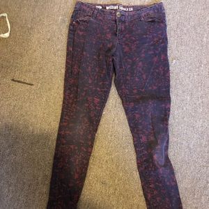Skinny, maroon, patterned Mossimo Supply jeans.